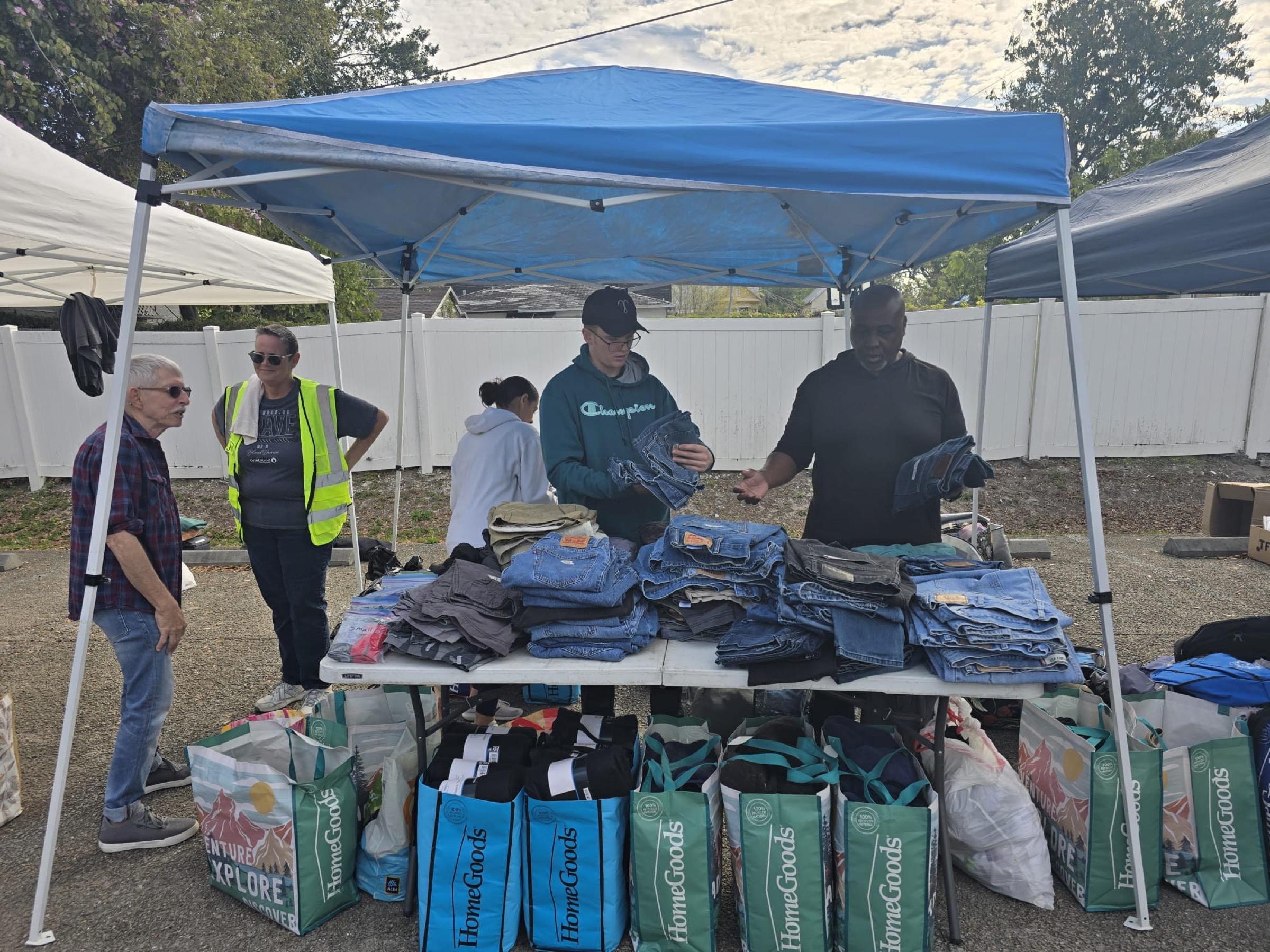 A rail of donated clothing at the mobile station